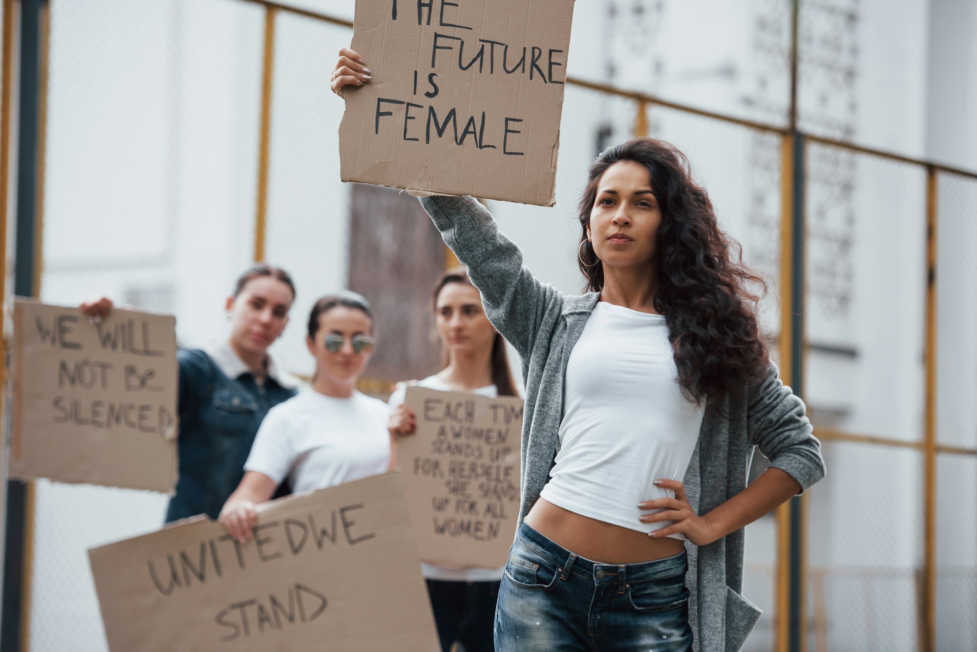 Hispanic ethnicity. Group of feminist women have protest for their rights outdoors